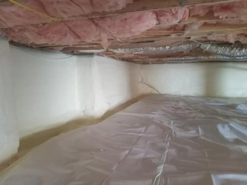 Crawl space encapsulation with closed-cell spray foam for Commercial Roof Restoration in Greenbelt